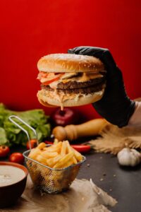 Juicy,Double,Burger,With,Melting,Sauce,,Fries,,And,Fresh,Ingredients.